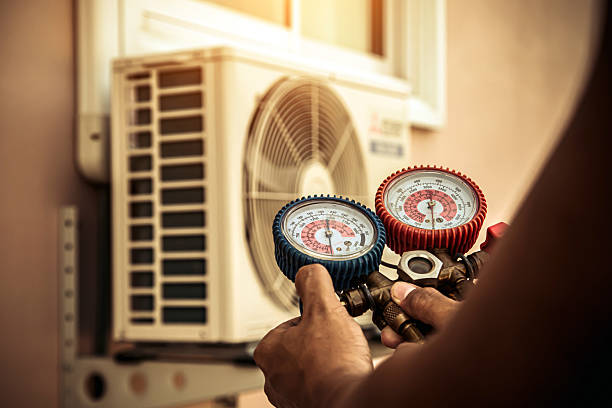 Professional Air Conditioning Service technician working in Centralia, IL